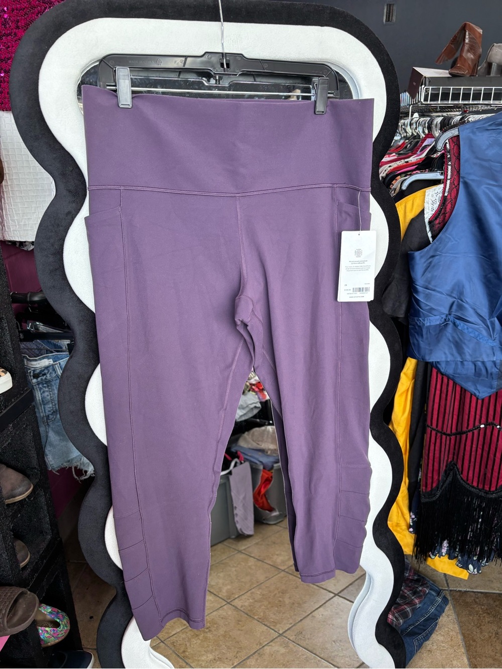 Athleta Plum Salutation Stash Pocket 7/8 Tights